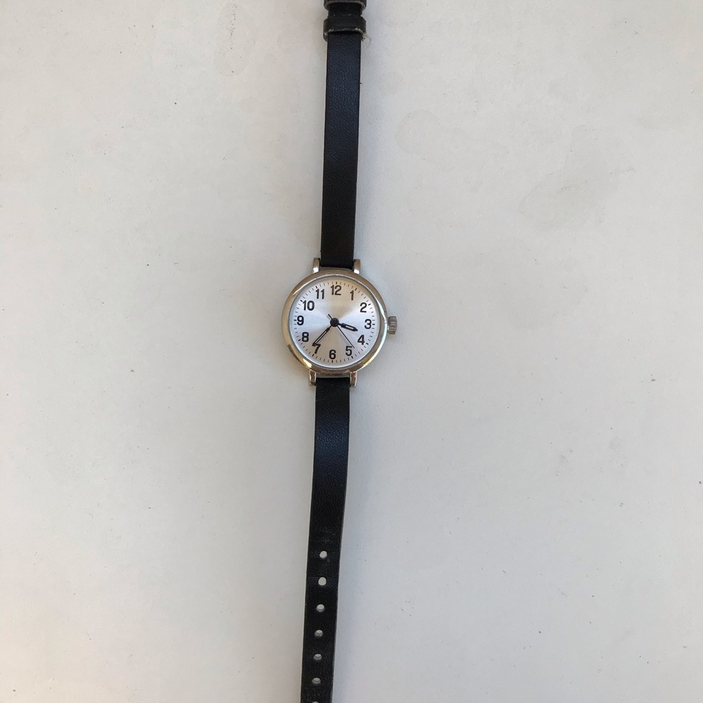 Watch with black band and silver face